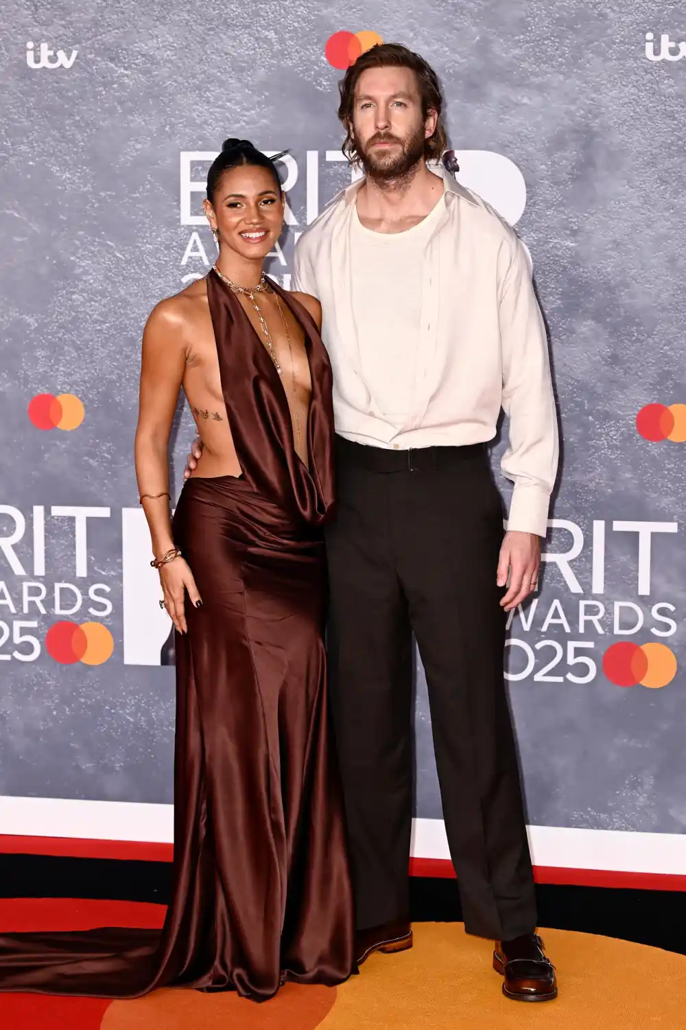 Calvin-Harris-Goes-Scruffy-at-2025-Brits-With-Wife-Vick-Hope